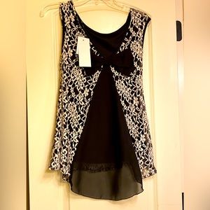 Women’s peplum top with cutesy back bow and sheer